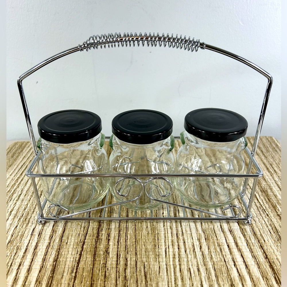 Metal rack with 3 covered jars